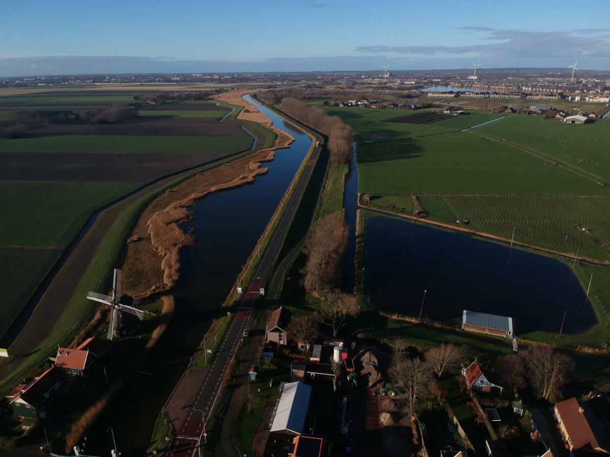 NATUURHUISJE met veranda Daar bij de Molen Alkmaar Oterleek Buitenkant foto